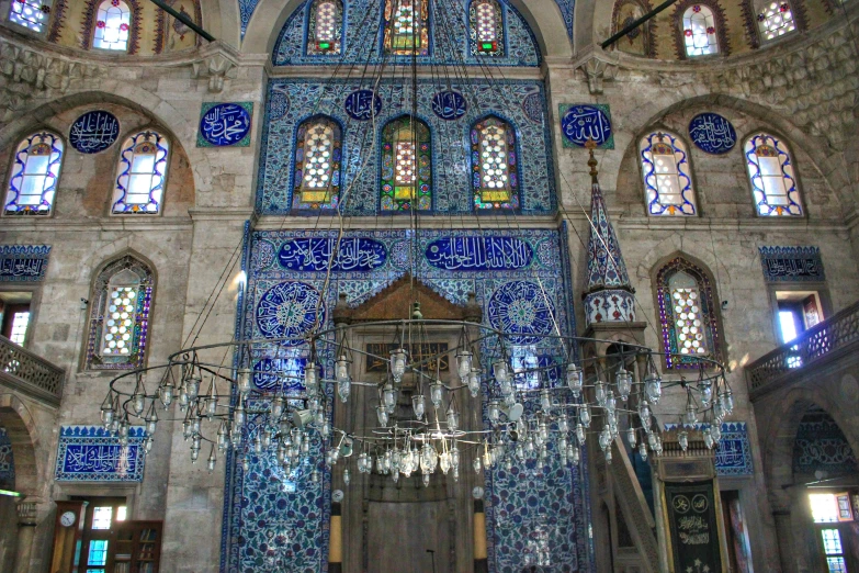 a church with stained glass windows and a chandelier, a mosaic, by Meredith Dillman, pexels, ottoman sultan, blue and black scheme, turkey, youtube thumbnail