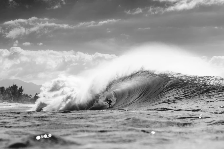 a man riding a wave on top of a surfboard, a black and white photo, by Tom Bonson, barrels, instagram post, photographic print, dustin lefevre