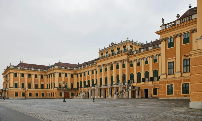 a large yellow building with a lot of windows, pexels contest winner, ornate palace made of green, 2 5 6 x 2 5 6 pixels, castelvania, taken in the early 2020s