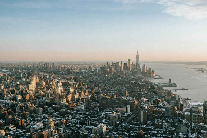 a view of a city from the top of a building, unsplash contest winner, hudson river school, sunny morning light, 2000s photo, high resolution image, 4k image”