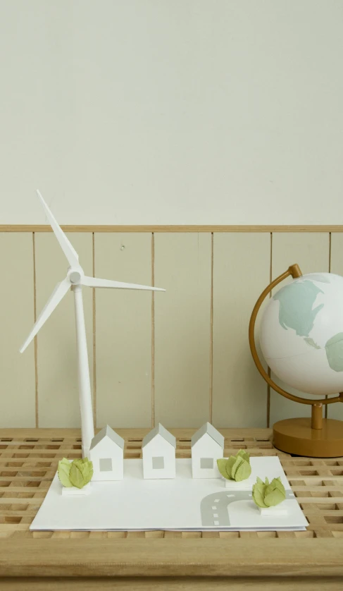 a model of a wind turbine sitting on top of a table, pexels contest winner, conceptual art, pastel green, globes, 15081959 21121991 01012000 4k, sweet home