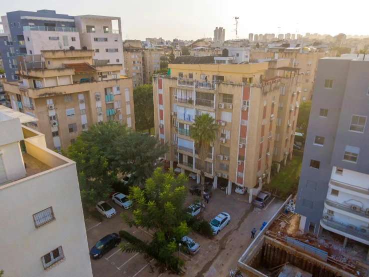 a view of a city from the top of a building, les nabis, flat, 3 meters, exterior photo, girih