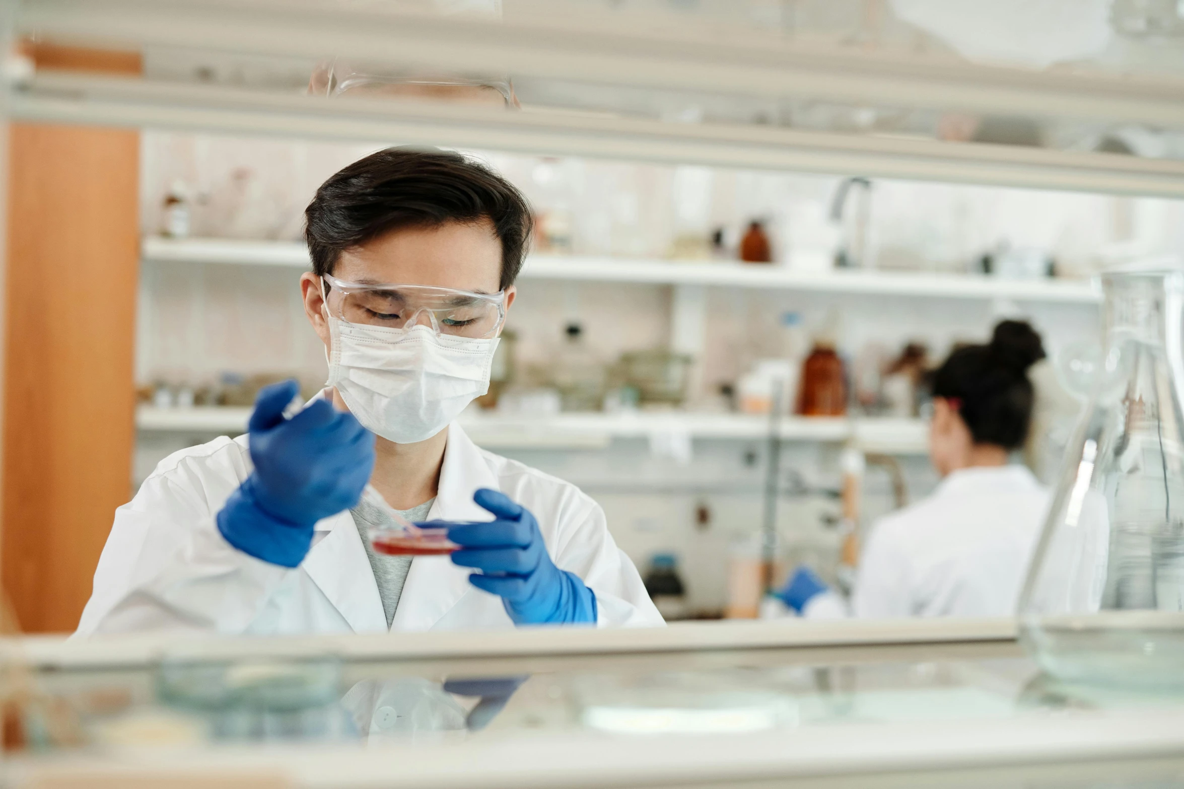 a close up of a person in a lab, a picture, shutterstock, asian origin, instagram post, abcdefghijklmnopqrstuvwxyz, thumbnail