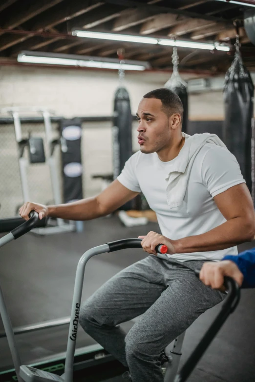 a man and a woman working out in a gym, by Robbie Trevino, feedback loop, portrait photo, mohamed chahin, panoramic shot