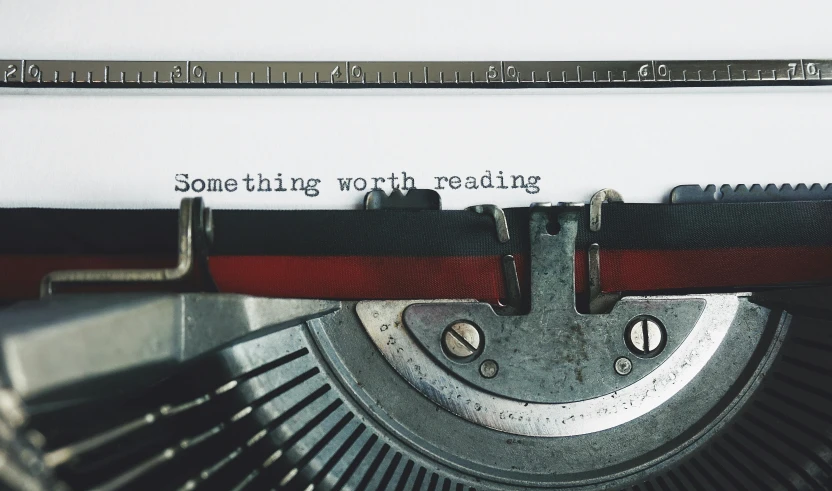 a close up of an old typewriter, a photo, by Carey Morris, pexels contest winner, aestheticism, reading the book about love, looking upwards, large text, instagram post