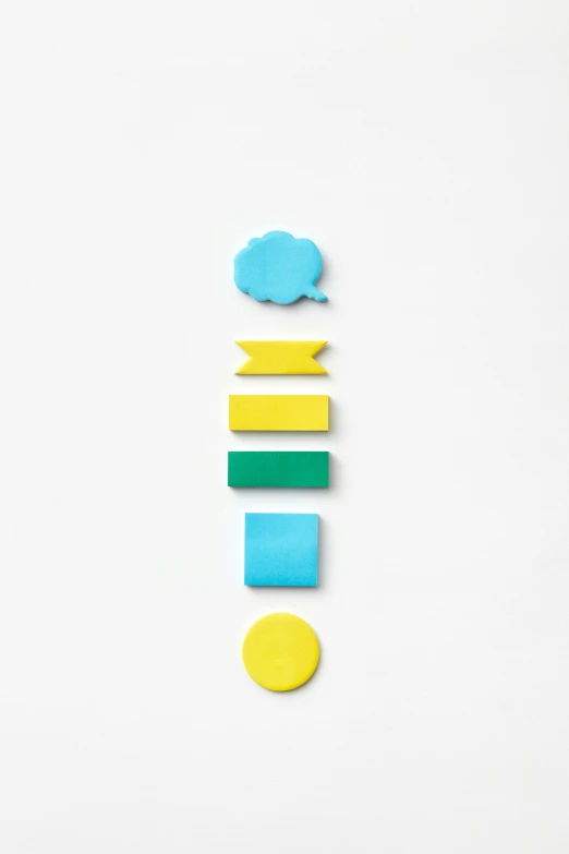 a number of different shapes on a white surface, trending on pexels, conceptual art, yellow and blue and cyan, speech bubbles, colorful hilt, product design shot
