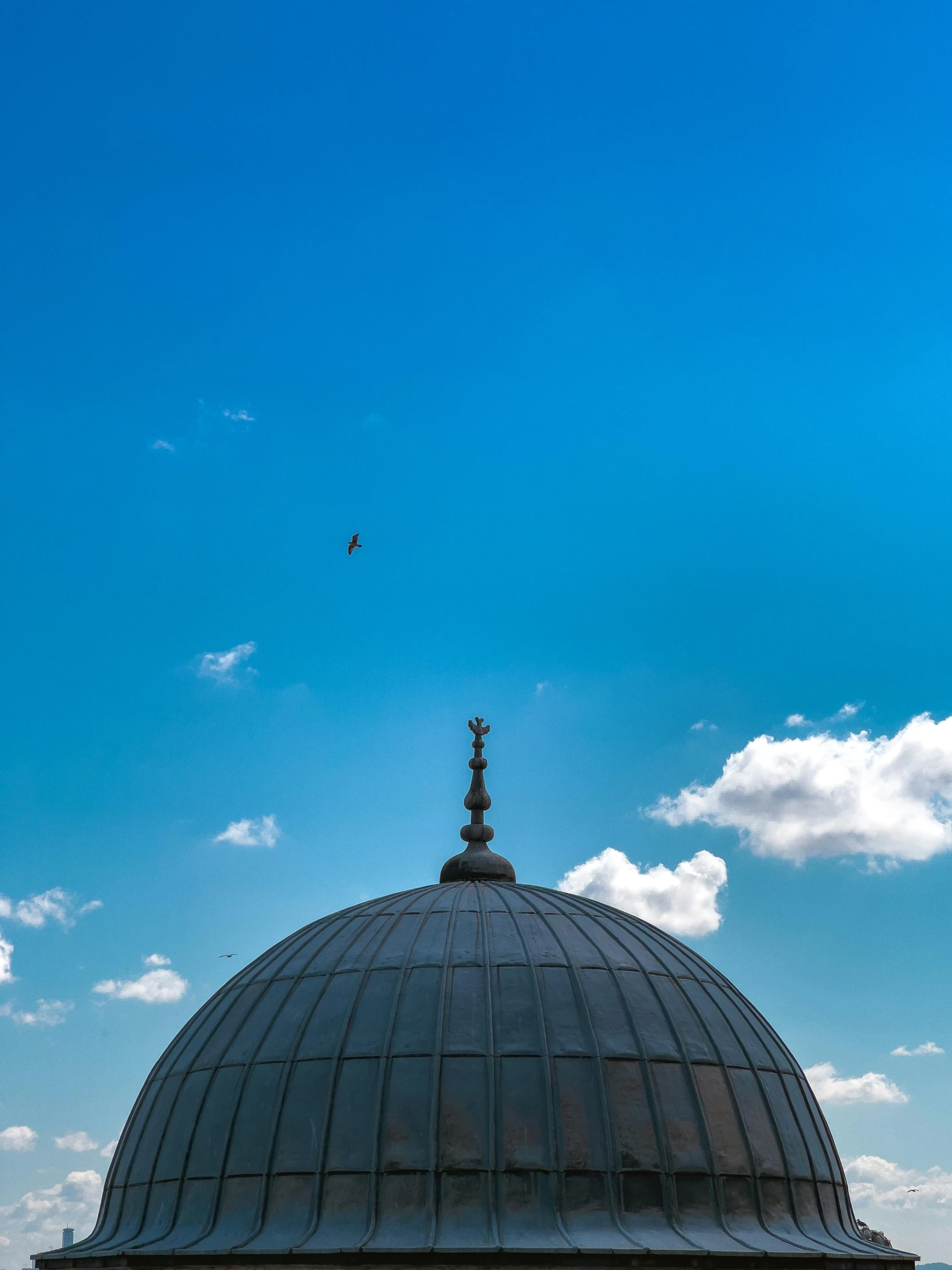 a dome on top of a building under a blue sky, by Julia Pishtar, pexels contest winner, turkey, high angel distant shot, middle eastern details, 2022 photograph