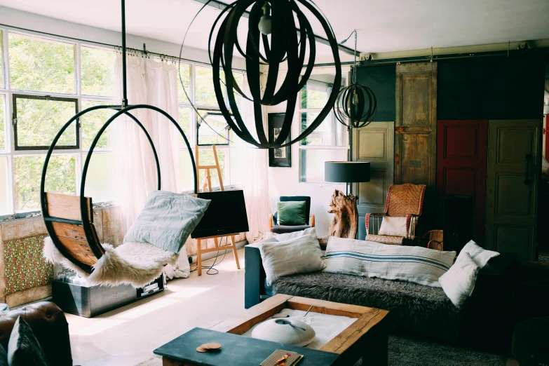 a living room filled with furniture and a chandelier, pexels contest winner, hanging lanterns, hanging out with orbs, modern rustic, afternoon hangout