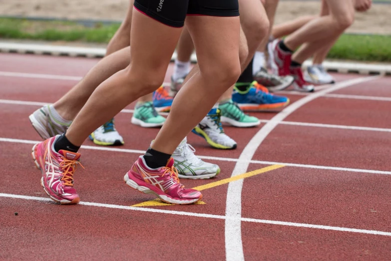 a group of people running on a track, profile image, sports photo, thumbnail, legs