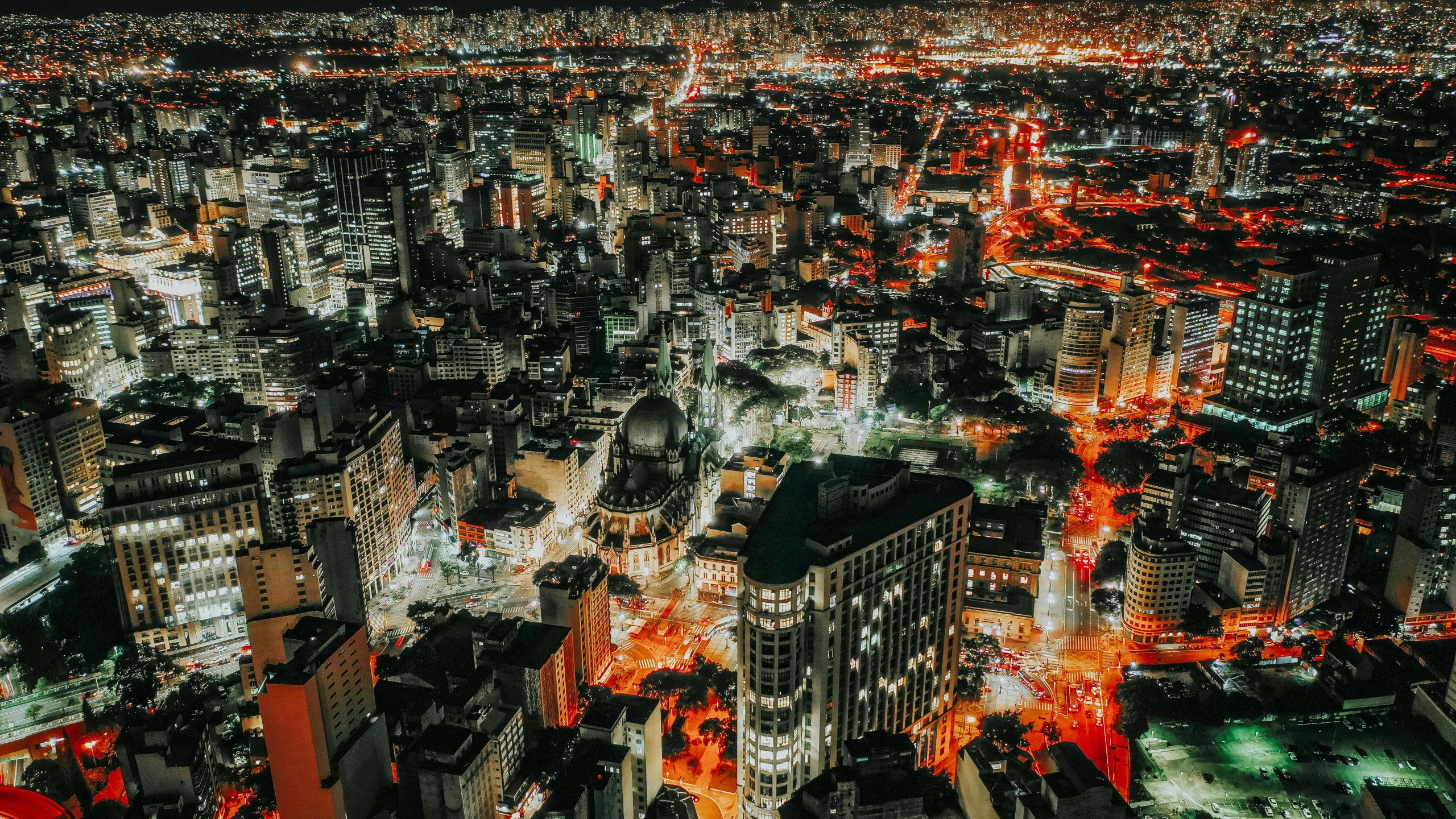 an aerial view of a city at night, by Ceferí Olivé, unsplash photography, brazil, nightlife, instagram photo