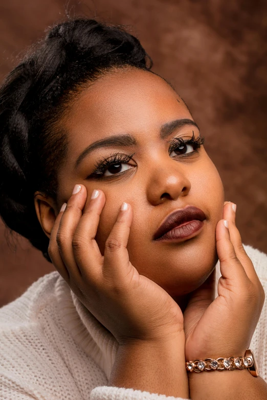 a woman posing for a picture with her hands on her face, inspired by Esaias Boursse, trending on pexels, light-brown skin, rubenesque, close - up studio photo, pondering