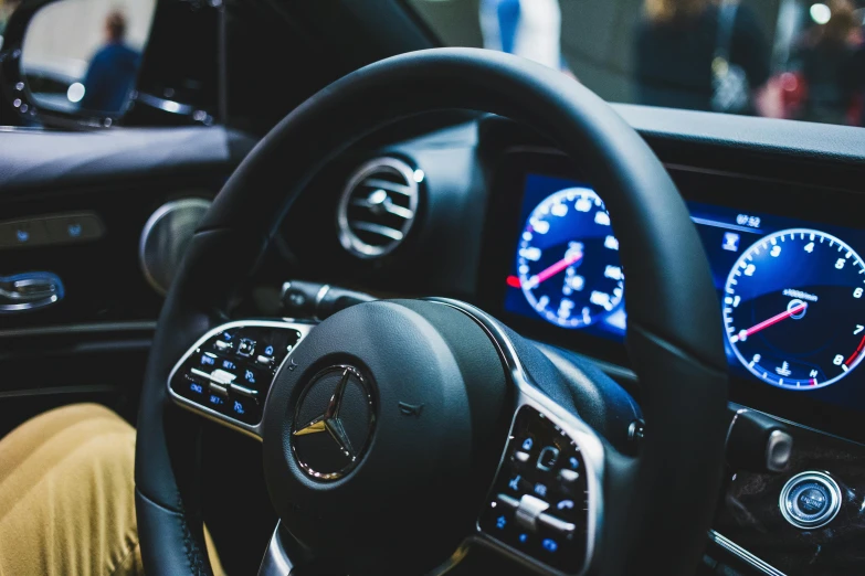 a close up of a steering wheel in a car, pexels, mercedez benz, avatar image, profile image, inside a grand