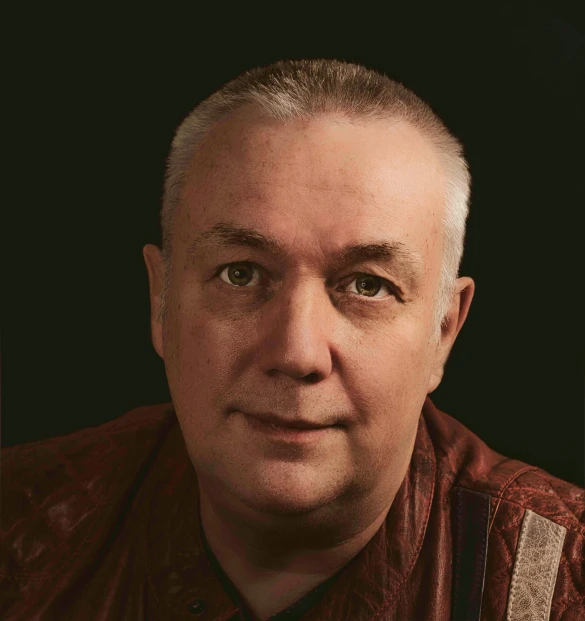 a close up of a person wearing a shirt and tie, a photo, inspired by Mikhail Lebedev, hurufiyya, press shot, buddhist, douglas adams, official photo