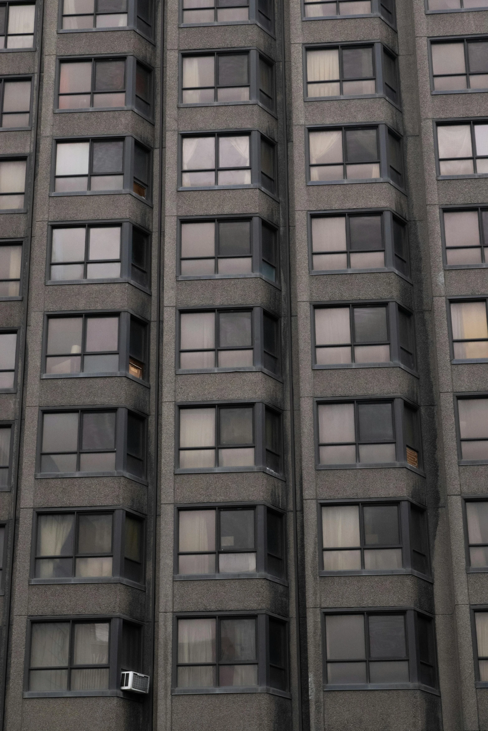 a very tall building with lots of windows, flickr, brutalism, photo of poor condition, zoomed out shot, gray men, 15081959 21121991 01012000 4k