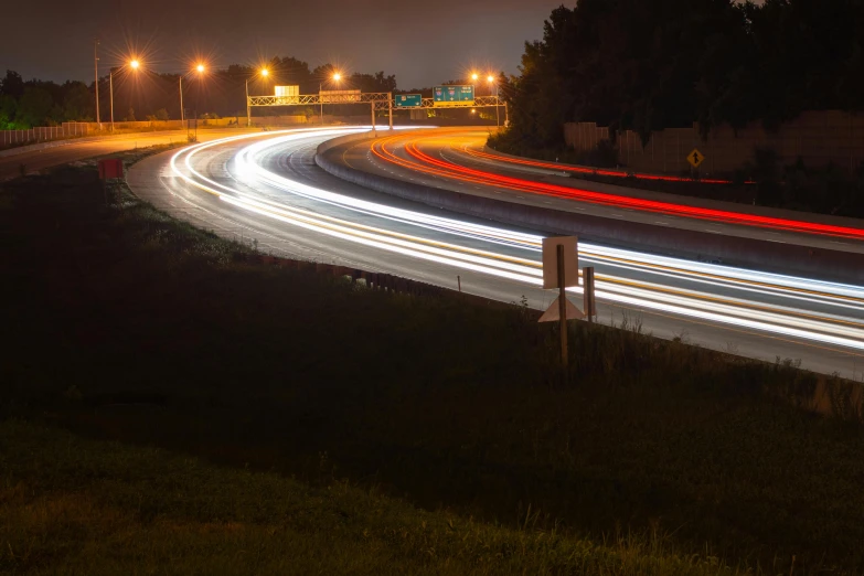 a long exposure photo of a highway at night, by Josh Bayer, unsplash contest winner, fan favorite, panning shot, summer night, scott radke