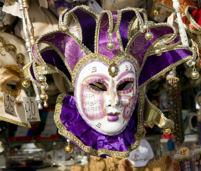 a close up of a purple and gold mask, costa blanca, white and purple, market, draped in purple