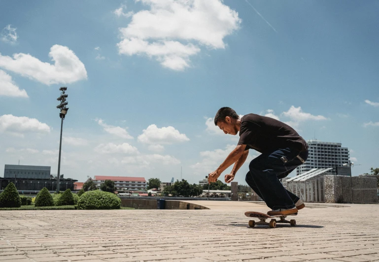 a man riding a skateboard down a sidewalk, pexels contest winner, at a skate park, hoang lap, 15081959 21121991 01012000 4k, instagram picture