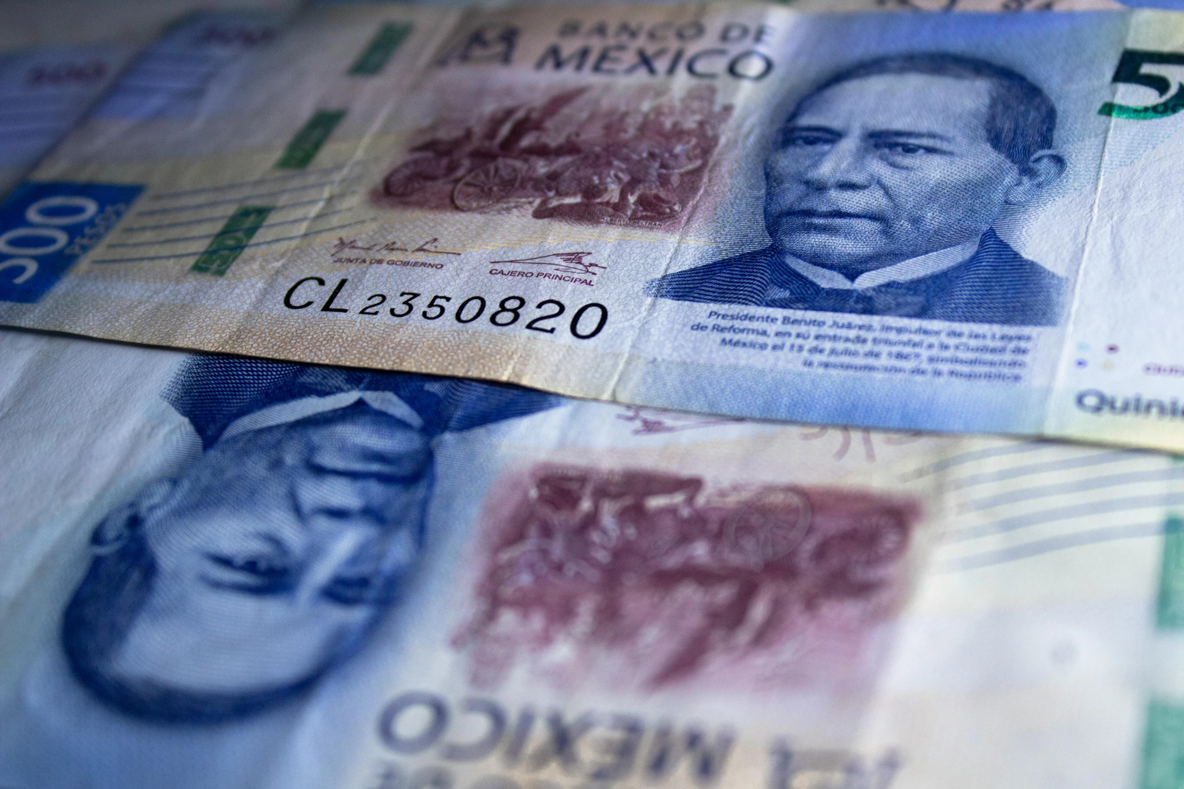 a pile of mexican currency sitting on top of a table, pexels, hyperrealism, thumbnail, two, close - up photo, 🎨🖌️