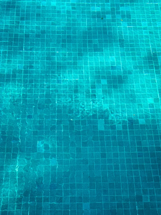 a person standing on a surfboard in a pool, a mosaic, by Carey Morris, minimalism, floating. greenish blue, underwater view, 2 5 6 x 2 5 6 pixels, closeup!!