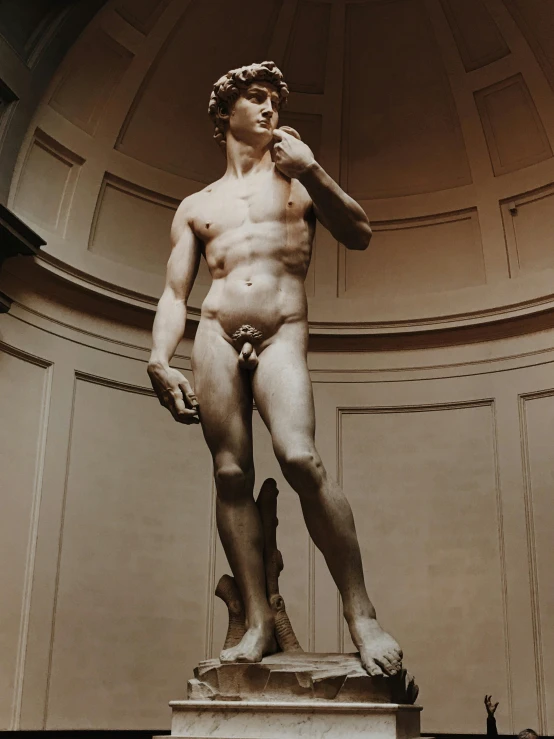 a statue of a man talking on a cell phone, inspired by Michaelangelo, pexels contest winner, mannerism, sexy :8, instagram story, statue of david, confident stance