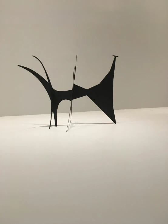 a sculpture of a cat on a white surface, an abstract sculpture, by Alexander Milne Calder, iphone photo, large mosquito wings, 15081959 21121991 01012000 4k, museum quality