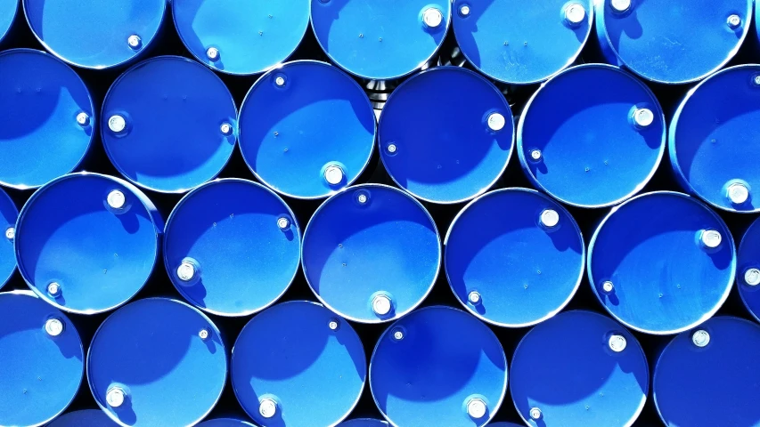 a bunch of blue barrels stacked on top of each other, an album cover, flickr, resources background, oil lines, thumbnail, bright blue future