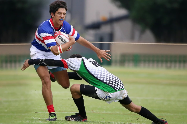 a group of young men playing a game of rugby, action sports photography, 15081959 21121991 01012000 4k, no blur, sao paulo