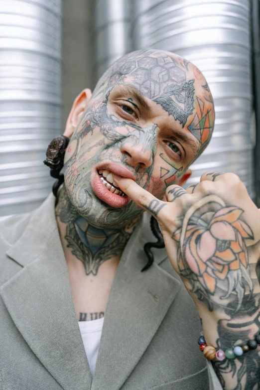 a man with a lot of tattoos on his face, inspired by Seb McKinnon, trending on pexels, hyperrealism, gang members, tongue out, 2000s, hypebeast