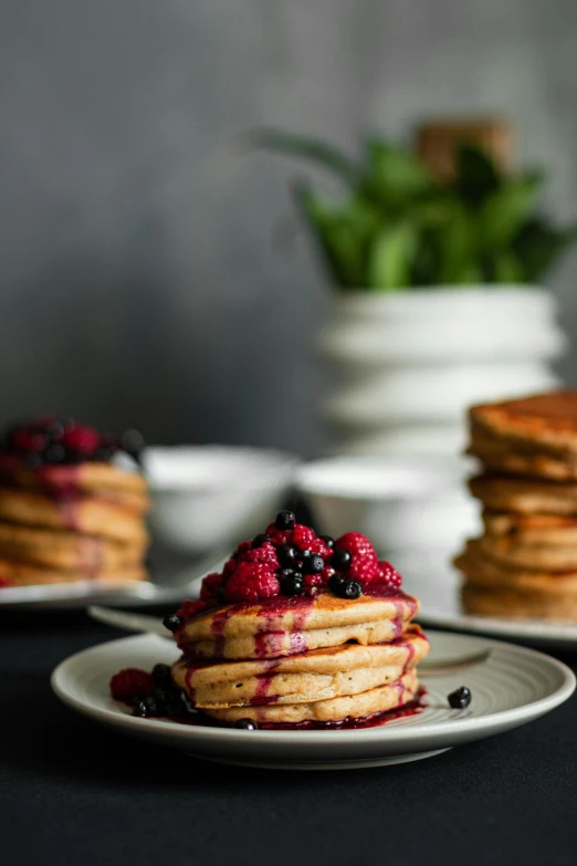 a stack of pancakes sitting on top of a white plate, a portrait, unsplash, wild berries, full product shot, background image, thumbnail