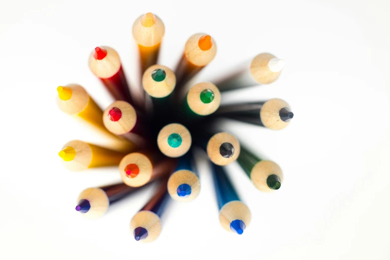 a group of colored pencils arranged in a circle, an album cover, pexels, crayon art, high key detailed, dezeen, center of focus, no logo