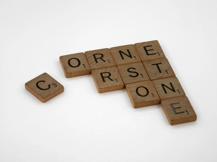 a couple of scrabbles sitting on top of each other, inspired by Constantin Hansen, unsplash contest winner, constructivism, comets, heartstone, never one - to - one, funny jumbled letters