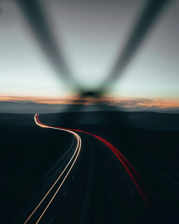 a long exposure photo of a highway at dusk, an album cover, pexels contest winner, happening, lights beam, flying over the horizon, movie footage, snapchat photo