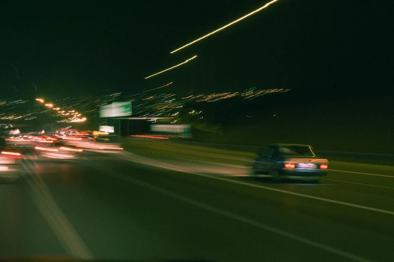 a city street filled with lots of traffic at night, a picture, unsplash, william eggleston, high speed chase, 1 4 9 3, photo 8 k