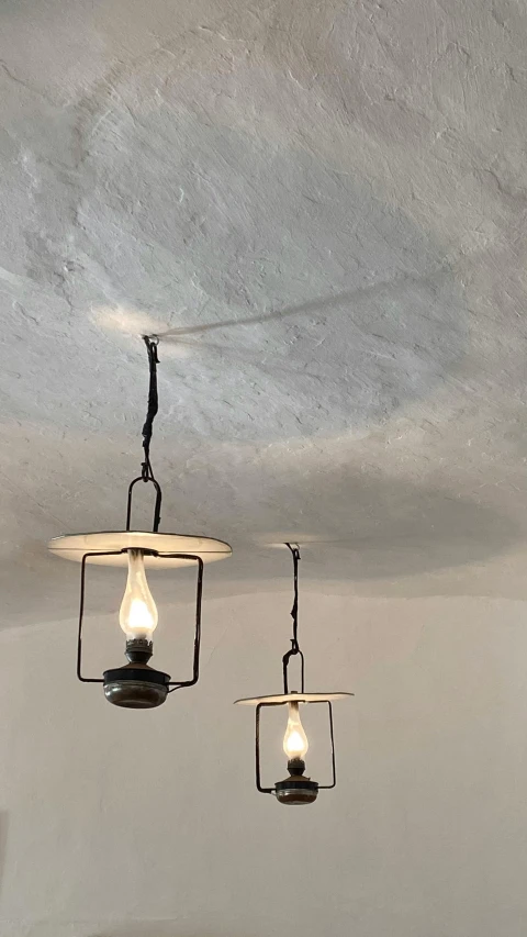 a couple of lights hanging from the ceiling, by Adam Pijnacker, traditional corsican, patina, lightening, finely painted