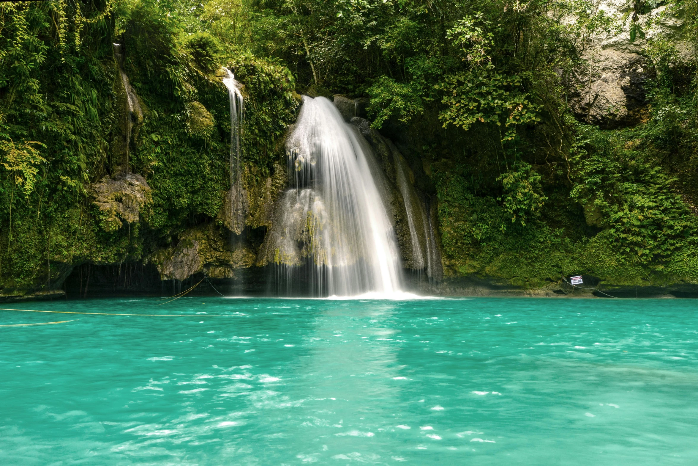 a waterfall in the middle of a lush green forest, an album cover, pexels contest winner, sumatraism, turquoise water, philippines, lake blue, thumbnail