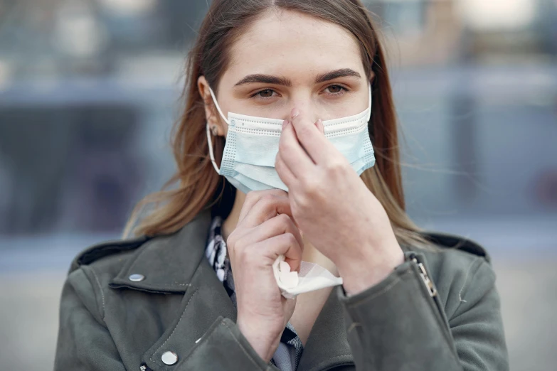 a woman with a face mask covering her mouth, happening, nasal strip, grey, square, thumbnail