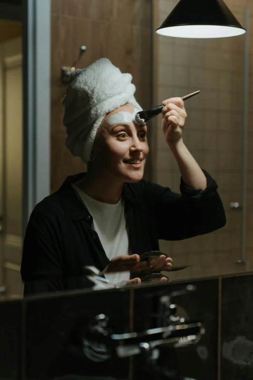 a woman getting her hair done in front of a mirror, by Julia Pishtar, reddit, beaked mask, looking happy, black eye mask, evening at dusk