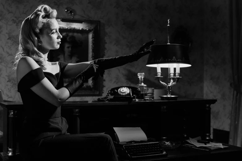 a woman sitting at a desk with a typewriter, inspired by Evaline Ness, pixabay, surrealism, film noir lighting, exquisite black accessories, a blond, holding up a night lamp