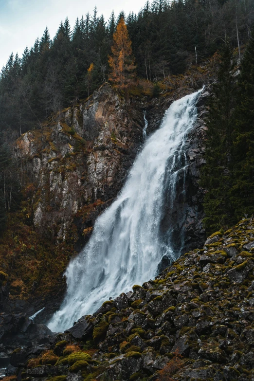 a waterfall in the middle of a forest, by Harry Haenigsen, pexels contest winner, landslides, banner, mid fall, front side full