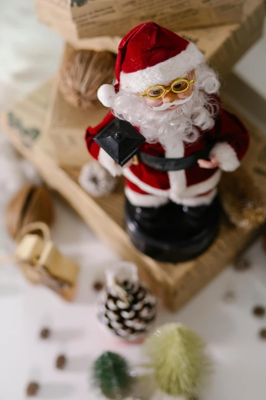 a close up of a figurine of a santa claus claus claus claus claus claus claus claus claus claus claus claus claus claus claus claus claus, by Julia Pishtar, pexels, process art, 🐝👗👾, with small object details, vintage vibe, black