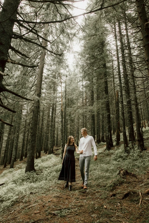 a man and a woman walking through a forest, by Sebastian Spreng, pexels contest winner, renaissance, portrait of tall, [ cinematic, with a long, studio photo