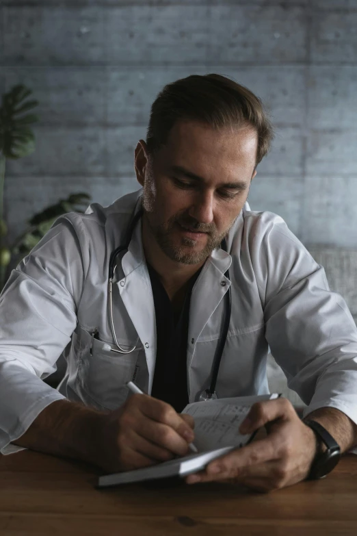 a man sitting at a table writing on a piece of paper, doctor, grey, artem demura, multiple stories