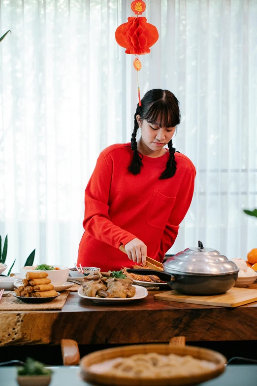 a woman in a red shirt preparing food on a table, inspired by Cui Bai, pexels contest winner, breakfast buffet, scene from a dinner party, gif, profile image