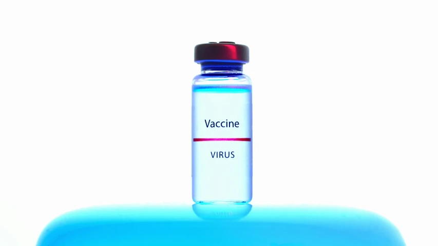 a bottle of vaccine sitting on top of a table, avatar image, high - key, 2263539546], valve