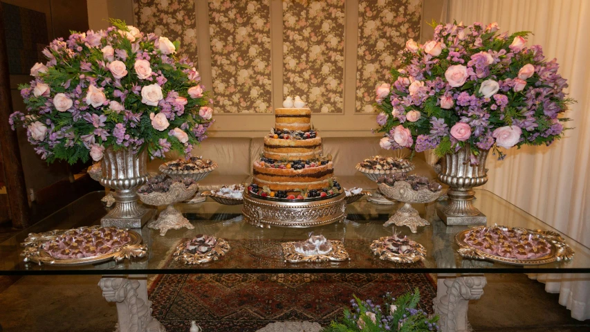 a table topped with lots of desserts and flowers, profile image, preserved historical, ornate retreat, showcase