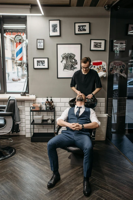 a man getting a haircut in a barber shop, a photo, by Niko Henrichon, pexels contest winner, luxurious environment, thumbnail, full body and head, relaxing