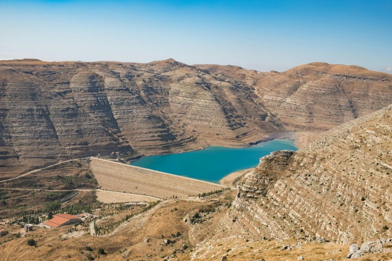 a large body of water sitting on top of a mountain, les nabis, meni chatzipanagiotou, fan favorite, mining, watch photo