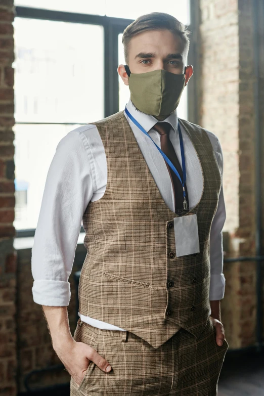 a man in a suit with a mask on his face, renaissance, tan vest, model is wearing techtical vest, daniel oxford, vintage muted colors