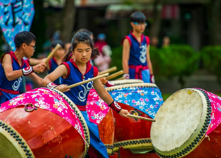 a group of people that are playing drums, pexels contest winner, cloisonnism, avatar image, korean girl, parade floats, focused photo
