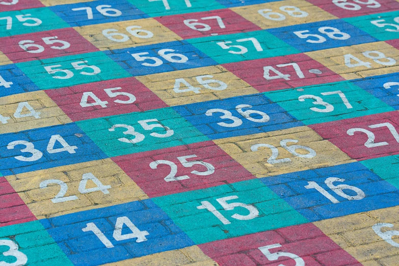 a colorful tile with numbers painted on it, by Konrad Witz, pixabay, playground, 3 2 x 3 2, square lines, paul barson